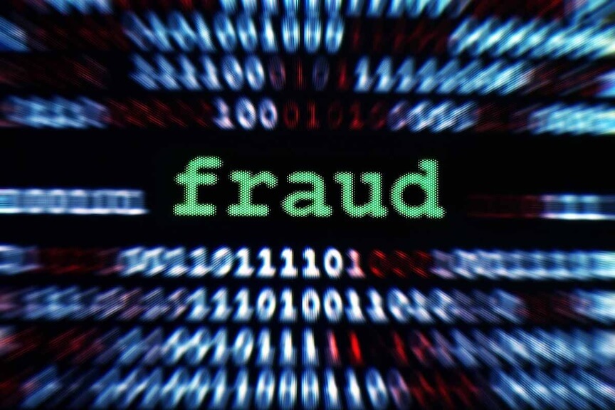 A graphic showing money being moved between two bank accounts in a fraudulent manner