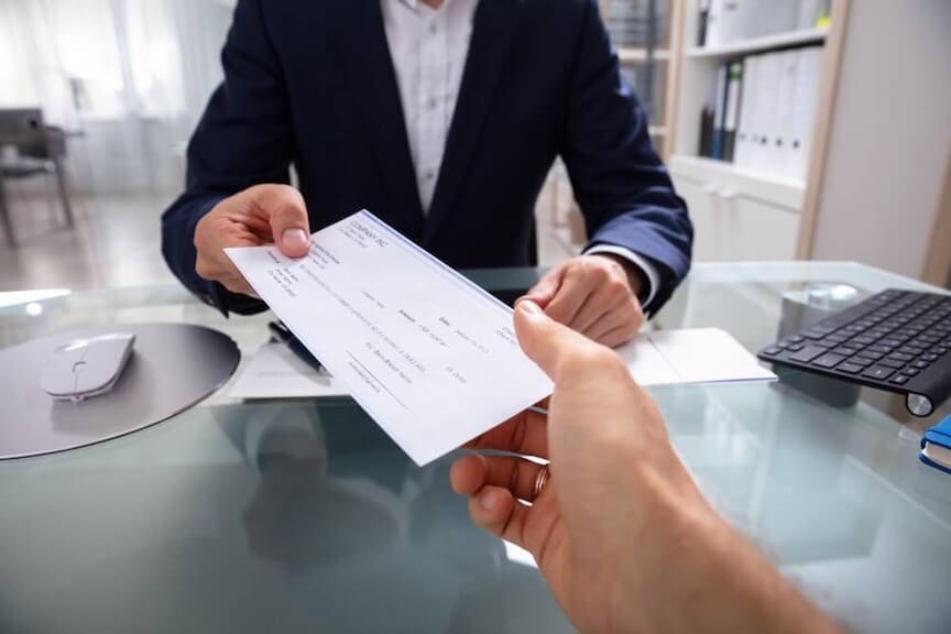 A picture of a check with a double endorsement on the back
