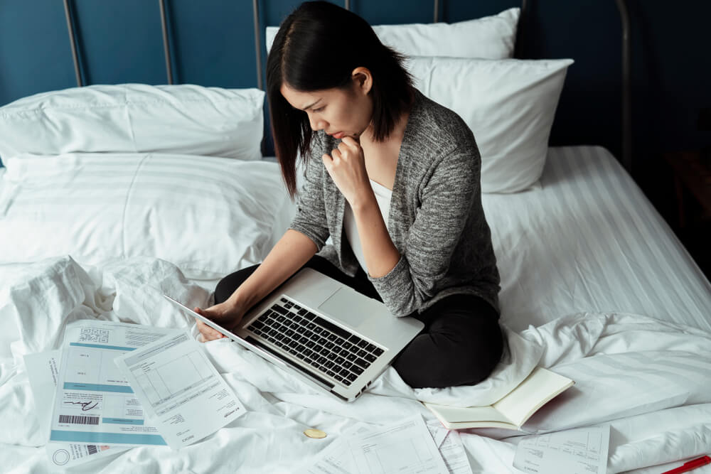 A Woman Checking Her Payment Information