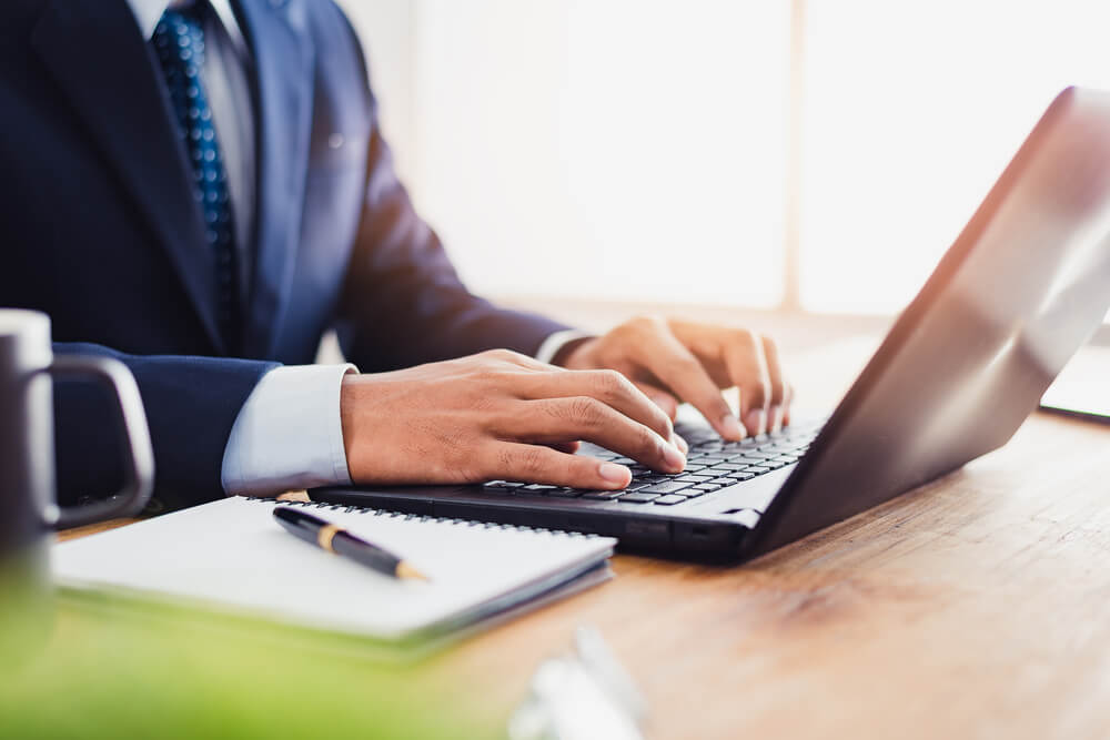 Businessman That Operate on Table Wood Being Checking Data