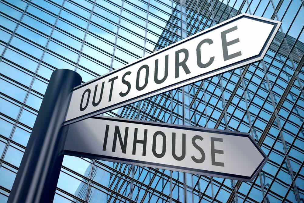 Outsource versus in-house decision showing why outsource check printing.