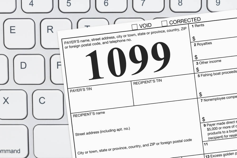 Doing Your Taxes As A Freelancer With A USA 1099 Form On A Keyboard